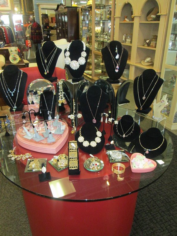 Necklaces, bracelets, and earrings on display