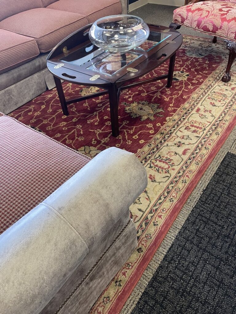 Cream and red Persian area rug