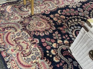 Navy and red Persian floral area rug